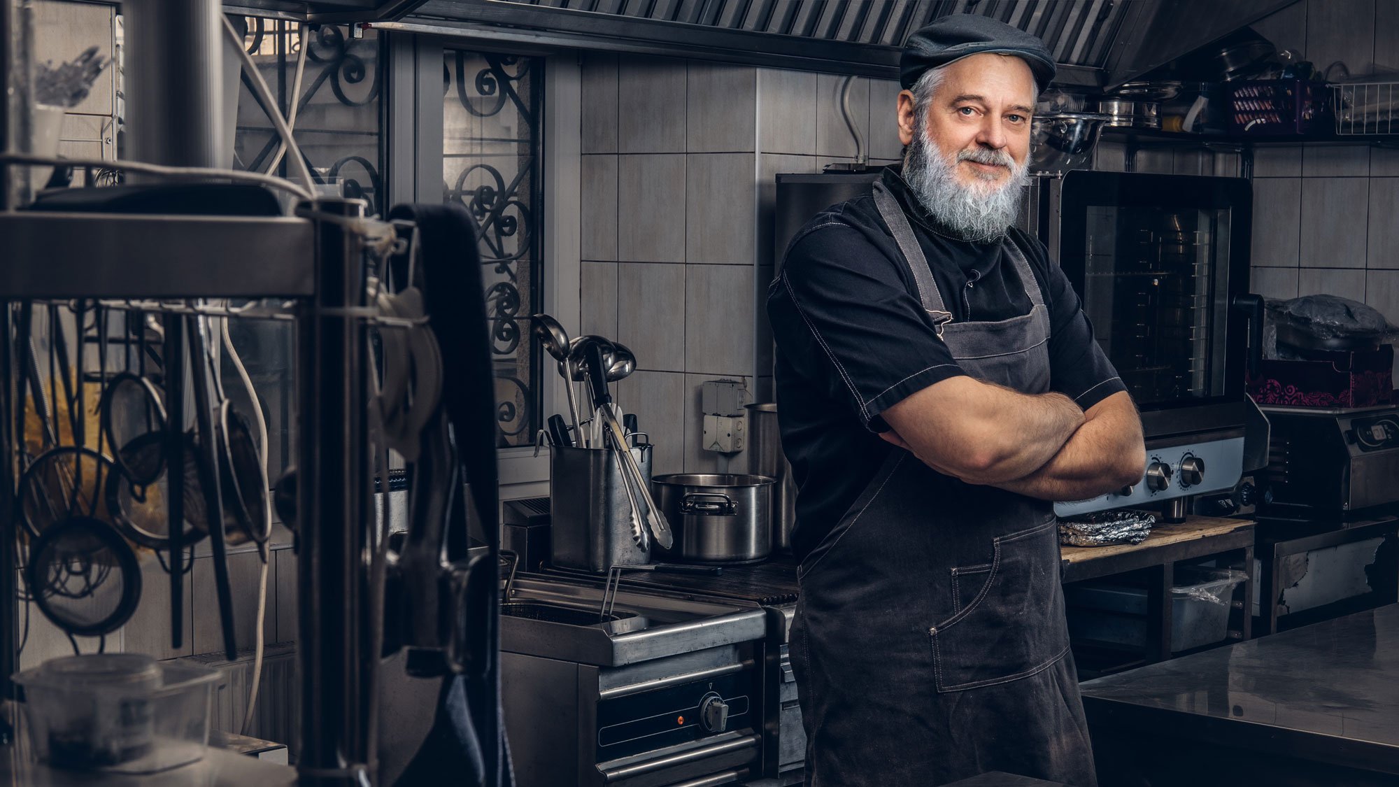 confident-elderly-chef-with-apron-and-cap-posing-w-2025-01-27-00-30-03-utc