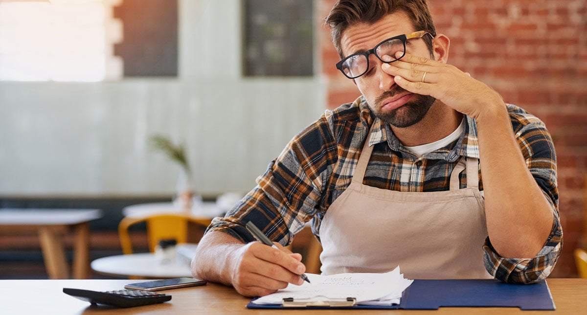 shot-of-an-exhausted-young-business-owner-doing-ad-2025-04-06-03-02-21-utc